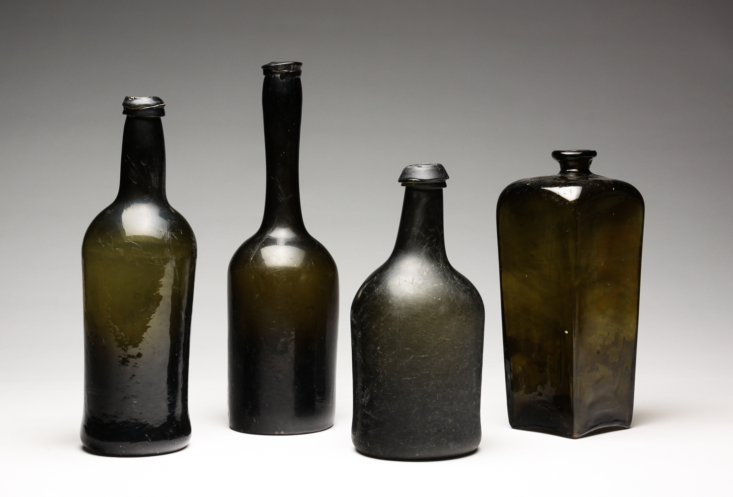 FOUR EUROPEAN BLOWN GLASS