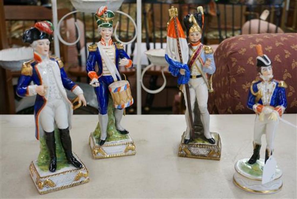 FOUR EUROPEAN PORCELAIN FIGURES