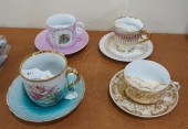 FOUR EUROPEAN PORCELAIN 'MUSTA