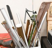 FOUR FISHING RODS AND SEVERAL