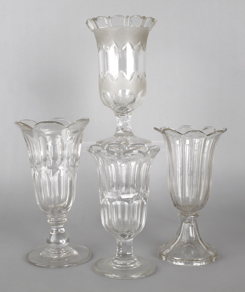 Four flint glass celery vases