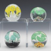 FOUR FLOWER PAPERWEIGHTS  Incl