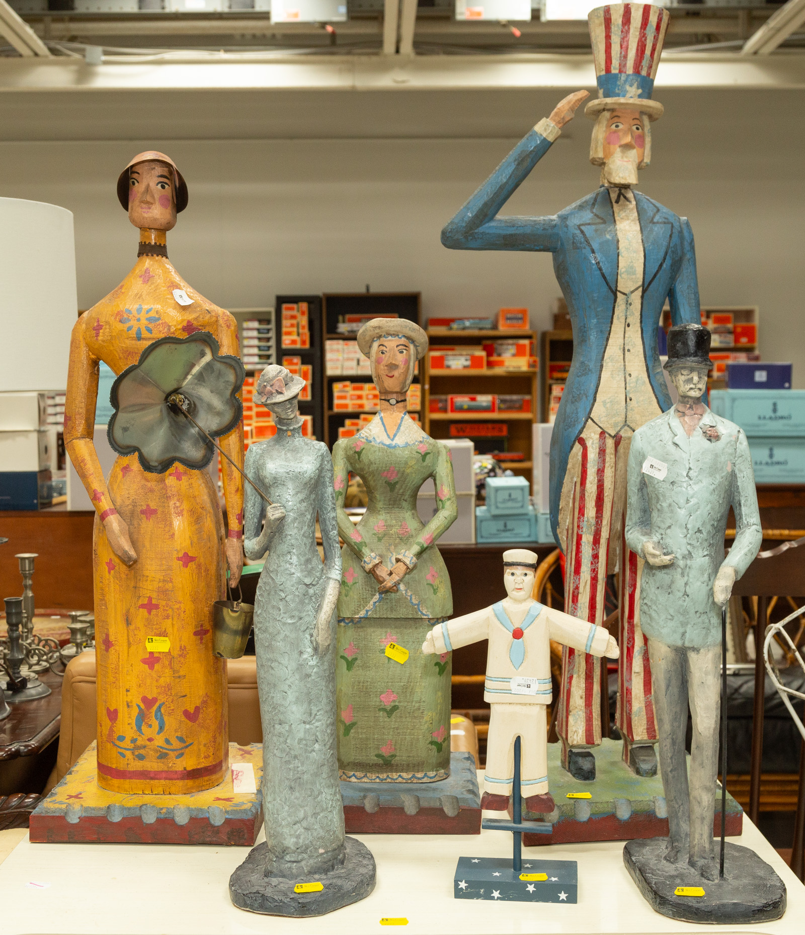 FOUR FOLK ART SCULPTURES; A PAIR OF