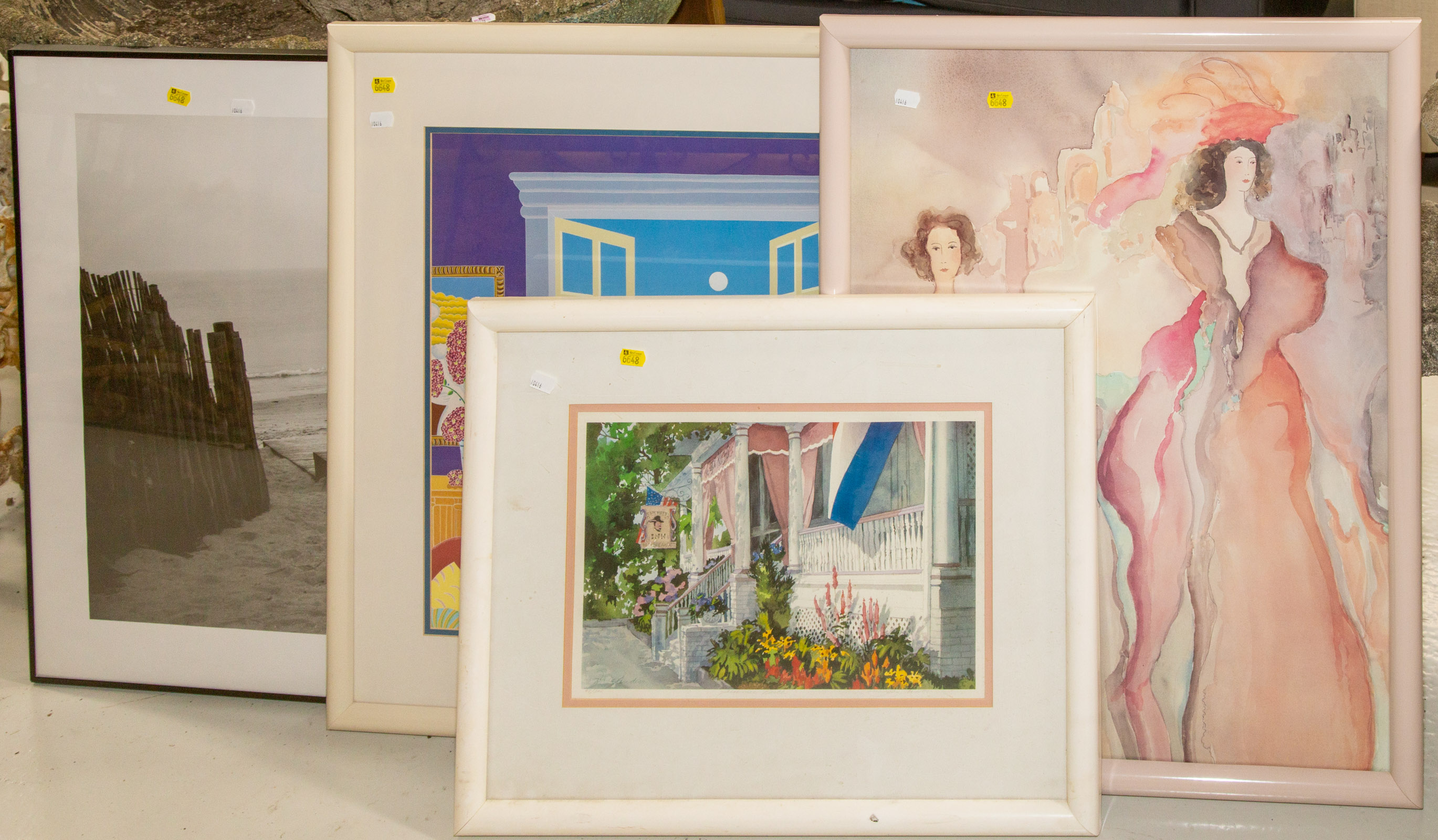 FOUR FRAMED PRINTS .