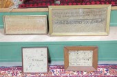 FOUR FRAMED SAMPLERS. A wool s