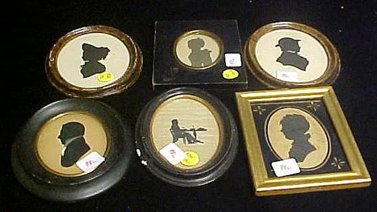 Four framed silhouettes  two men