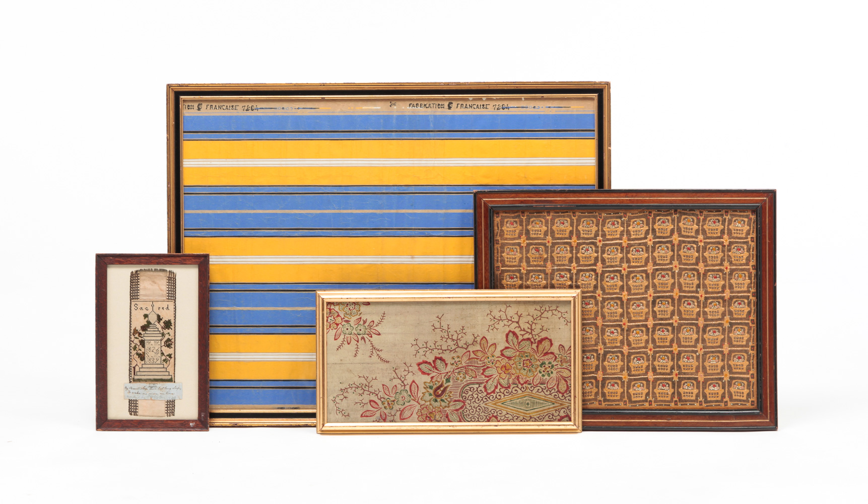 FOUR FRAMED WALLPAPER AND FABRIC