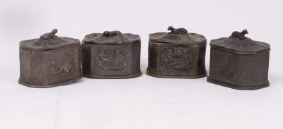 Four Georgian lead tobacco jars,