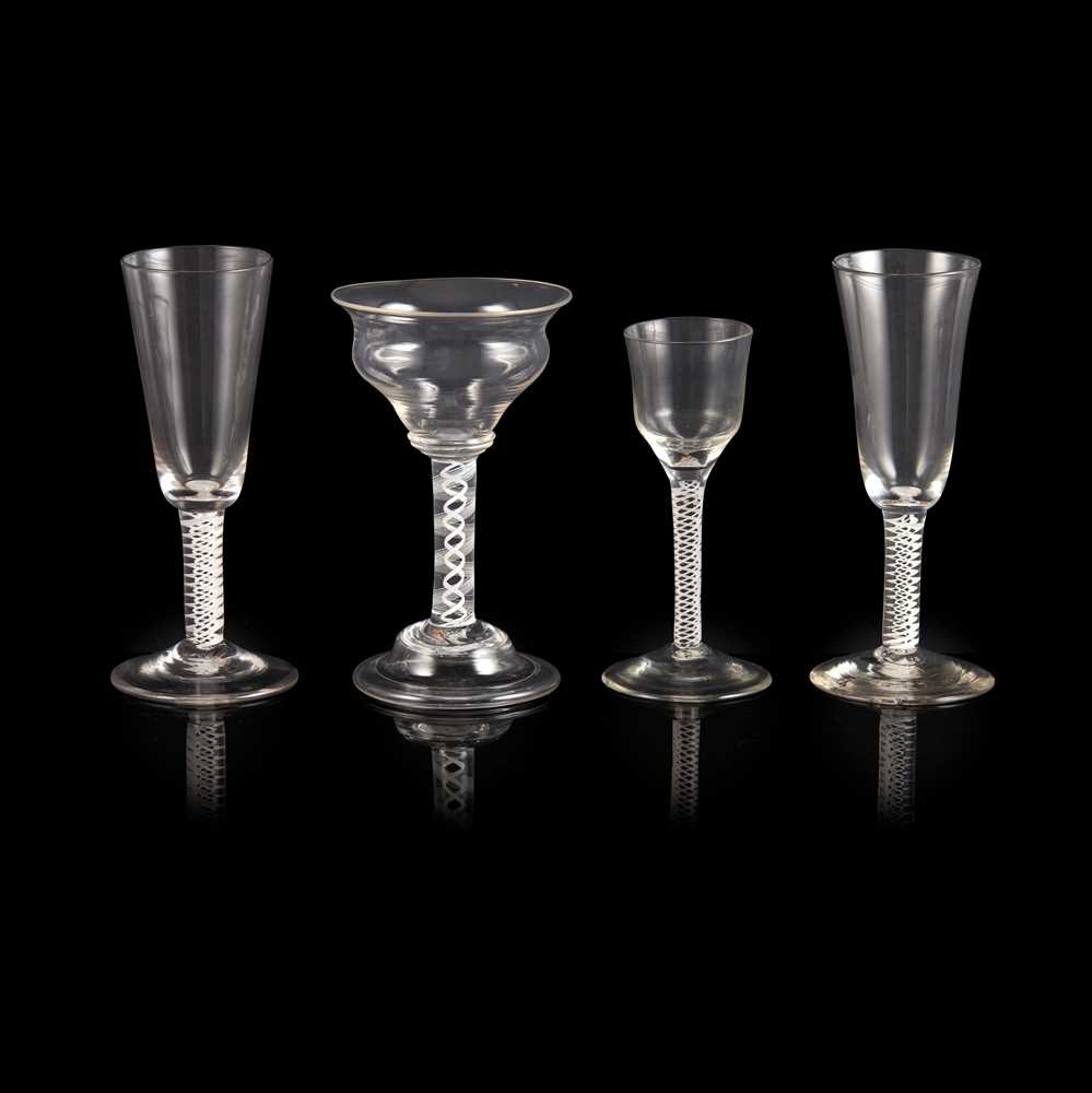 FOUR GEORGIAN OPAQUE-TWIST STEM