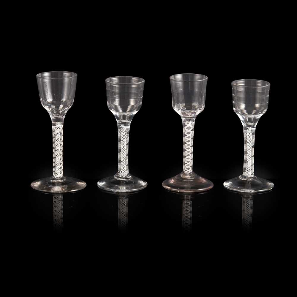 FOUR GEORGIAN OPAQUE-TWIST STEM