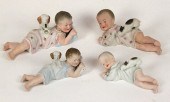 Four German bisque "Piano Baby