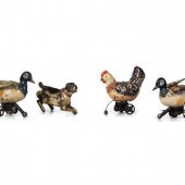 Four German Tin Windup Toys
Ea