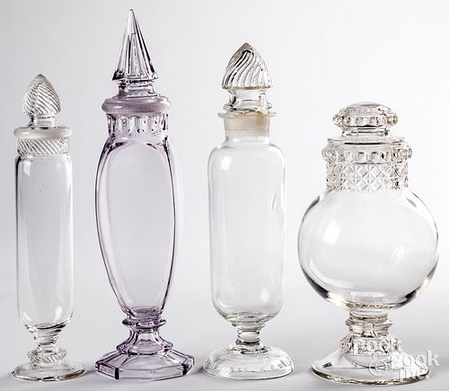 FOUR GLASS APOTHECARY JARSFour