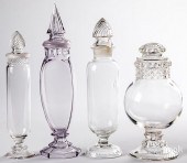 FOUR GLASS APOTHECARY JARSFour