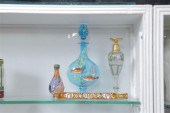 FOUR GLASS PERFUMES. Blue colo