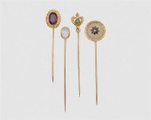 FOUR GOLD AND GEMSET STICKPINS