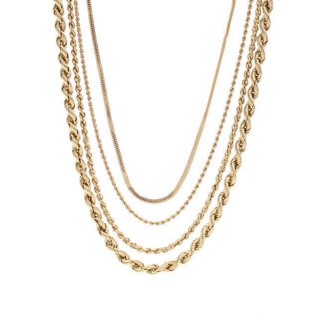 FOUR GOLD CHAINS To include: a