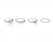 FOUR GOLD RINGSFour gold rings