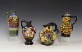 FOUR GOUDA POTTERY PITCHERS /