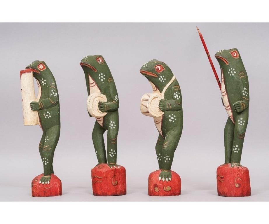 Four hand carved and painted wood