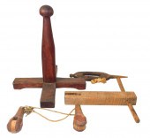 FOUR HAND-CRAFTED WOODEN TOOLS
