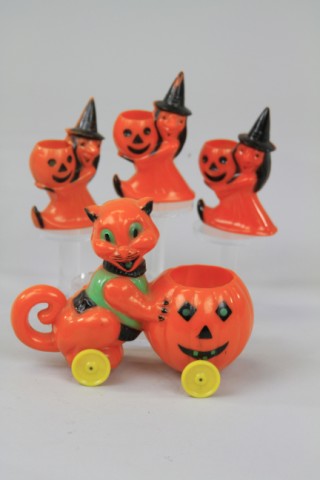 FOUR HARD PLASTIC HALLOWEEN TOYS