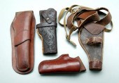 Four Heiser leather holsters: