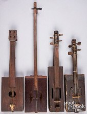 FOUR HOMEMADE FOLK ART STRINGE