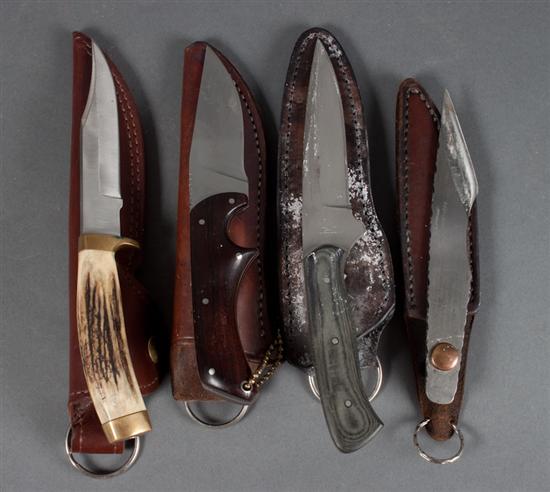 Four hunting knives by various