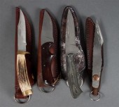 Four hunting knives by various