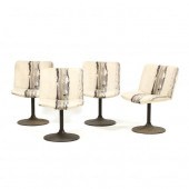 FOUR ICF MODERN SWIVEL CHAIRS