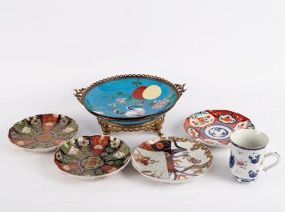 Four Imari plates with serrated