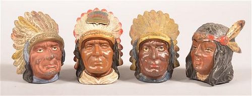 FOUR INDIAN BUST STILL BANKS.Four