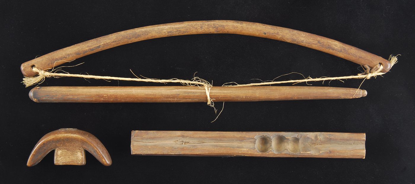 FOUR INUIT WOODEN FIRE-STARTING