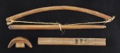 FOUR INUIT WOODEN FIRE-STARTIN