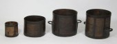 Four iron-bound cylindrical me