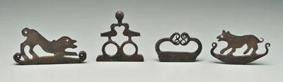 Four iron flint strikers: dog,