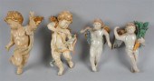 FOUR ITALIAN COMPOSITE CHERUBS