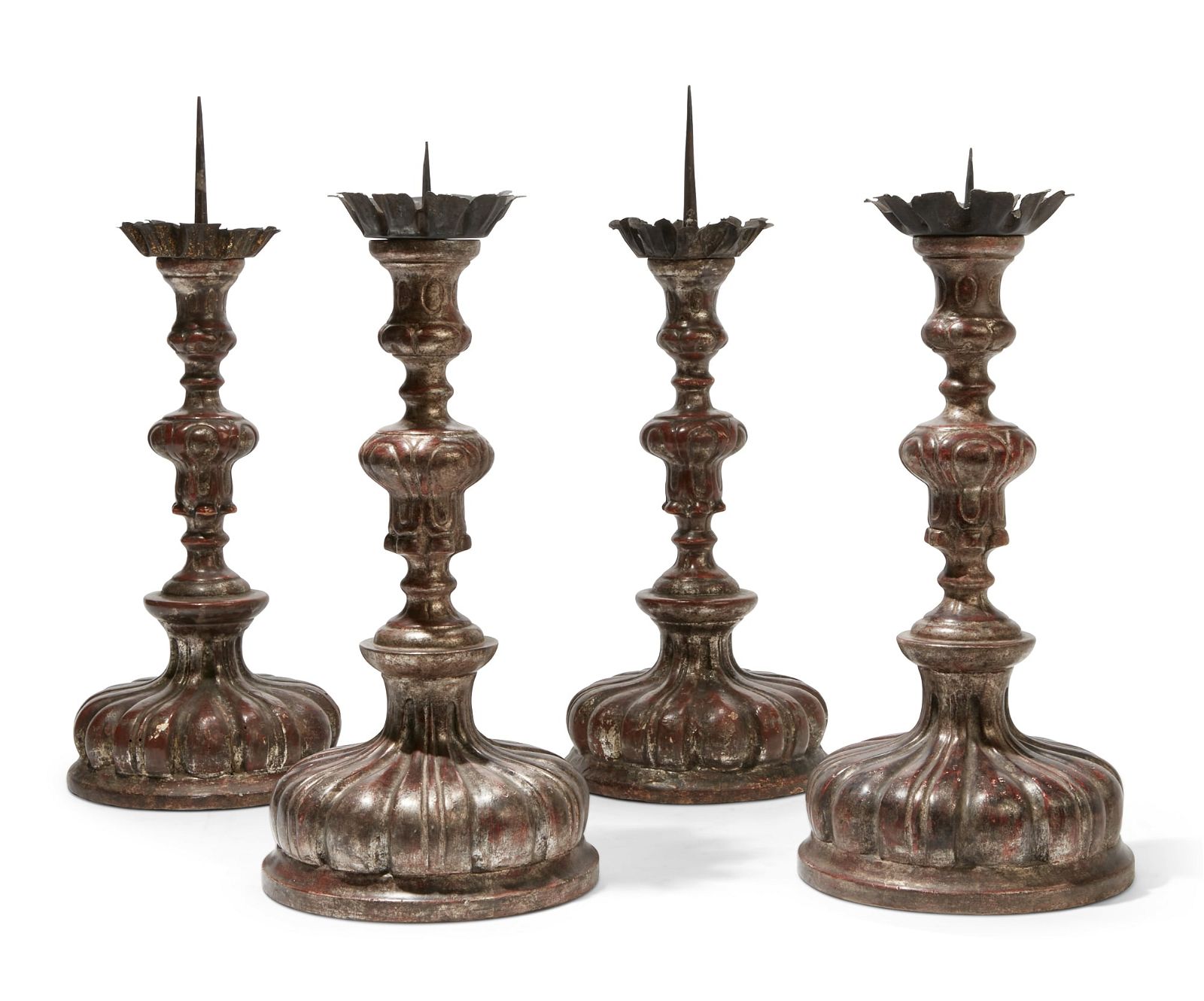 FOUR ITALIAN SILVER GILT PRICKET