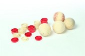 FOUR IVORY BILLIARD BALLS AND