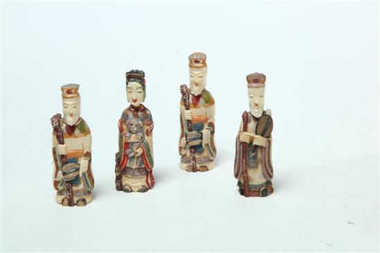 FOUR IVORY FIGURAL SNUFFS. 
