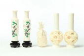 FOUR IVORY VASES AND A PINEAPP