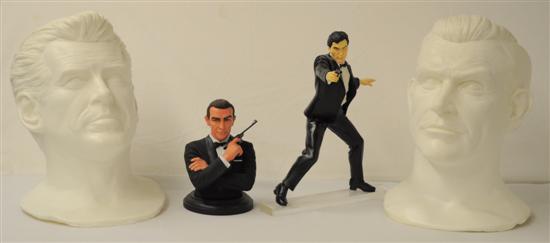 Four James Bond sculptures. Two
