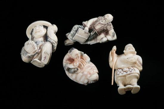 FOUR JAPANESE CARVED IVORY NETSUKE.