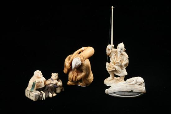 FOUR JAPANESE CARVED IVORY NETSUKE.