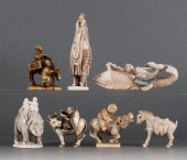 Four Japanese carved ivory net