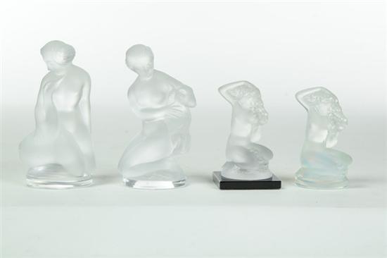 FOUR LALIQUE NUDE FIGURES.  France