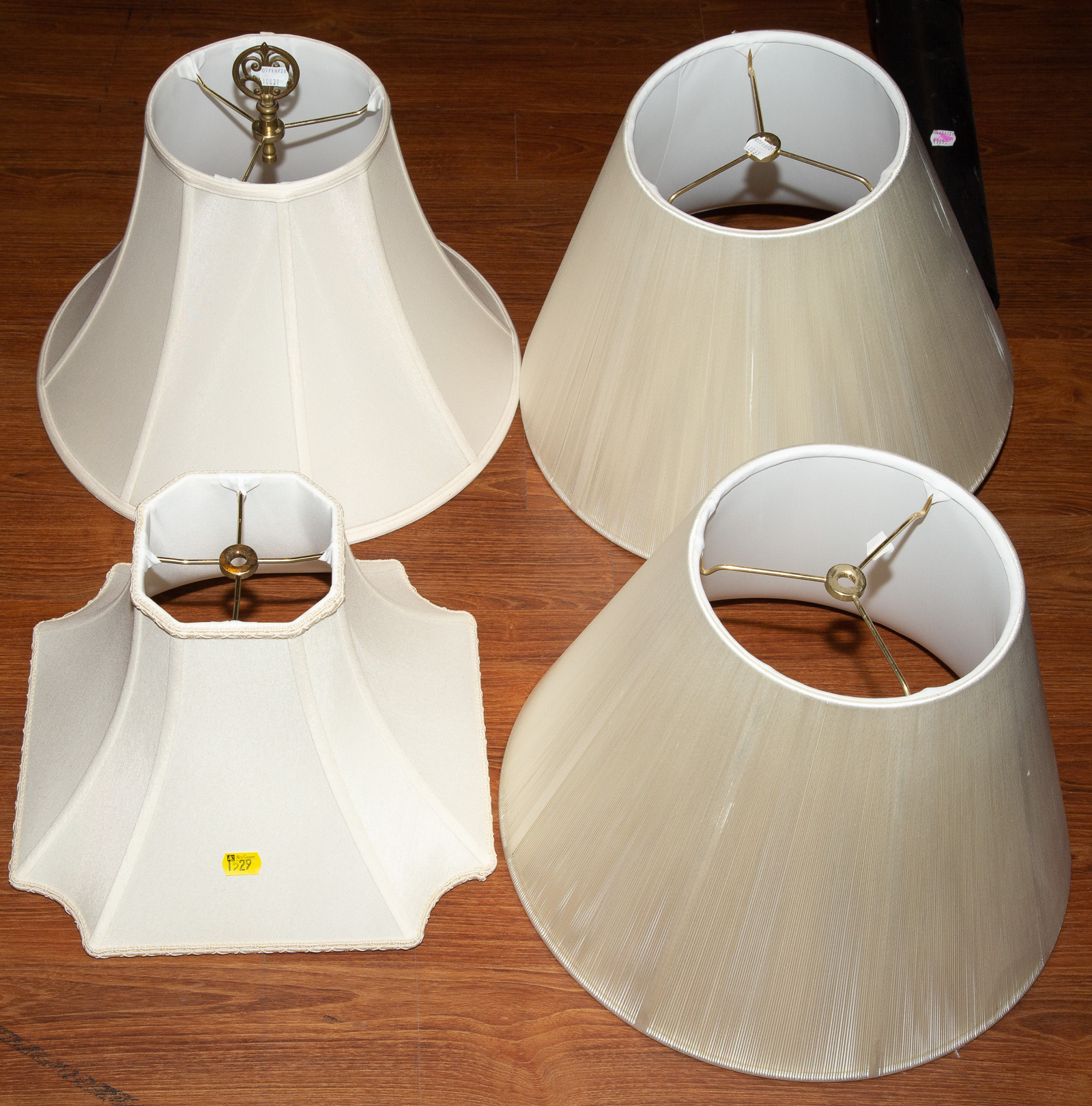 FOUR LAMP SHADES .