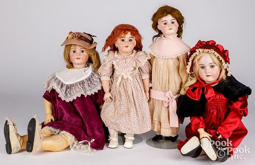 FOUR LARGE BISQUE HEAD DOLLSFour