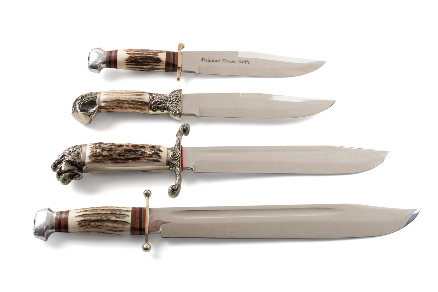 FOUR LARGE STAG HANDLE